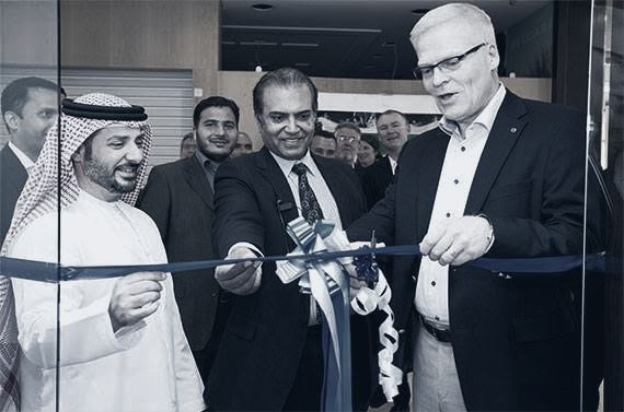 MBAL and AXON leadership at a location opening